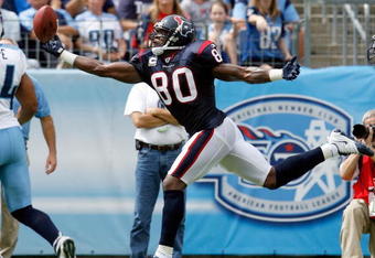 NASHVILLE, TN - SEPTEMBER 20:  Andre Johnson #80 of the Houston Texans catches a touchdown pass against the Tennessee Titans during the  NFL game at LP Field on September 20, 2009 in Nashville, Tennessee. The Texans won 34-31.  (Photo by Andy Lyons/Getty Images)