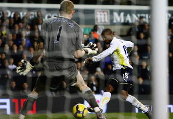 LONDON, ENGLAND - NOVEMBER 22:  Jermain Defoe of Tottenham Hotspur scores his fifth goal during the Barclays Premier League match between Tottenham Hotspur and Wigan Athletic at White Hart Lane on November 22, 2009 in London, England.  (Photo by Clive Rose/Getty Images)
