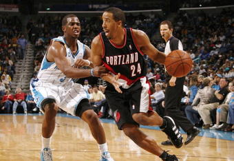 NEW ORLEANS - NOVEMBER 13:  Andre Miller #24 of the Portland Trail Blazers drives the ball against Chris Paul #3 of the New Orleans Hornets during the game at New Orleans Arena on November 13, 2009 in New Orleans, Louisiana.  NOTE TO USER: User expressly acknowledges and agrees that, by downloading and or using this photograph, User is consenting to the terms and conditions of the Getty Images License Agreement. (Photo by Chris Graythen/Getty Images)