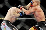 LAS VEGAS - NOVEMBER 21: Tito Ortiz (R) battles Forrest Griffin (L) during their Light Heavyweight Fight at the UFC 106 at Mandalay Bay Events Center on November 21, 2009 in Las Vegas, Nevada. (Photo by Jon Kopaloff/Getty Images)