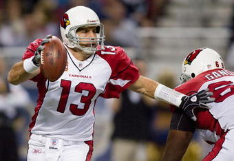 ST. LOUIS - NOVEMBER 22: Kurt Warner #13 of the Arizona Cardinals looks to pass against the St. Louis Rams at the Edward Jones Dome on November 22, 2009 in St. Louis, Missouri.  (Photo by Dilip Vishwanat/Getty Images)