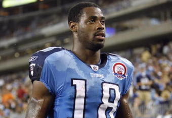 NASHVILLE, TN - AUGUST 15: Kenny Britt #18 of the Tennessee Titans looks on against the Tampa Bay Buccaneers during a preseason NFL game at LP Field on August 15, 2009 in Nashville, Tennessee. The Titans beat the Buccaneers 27-20. (Photo by Joe Murphy/Getty Images) 