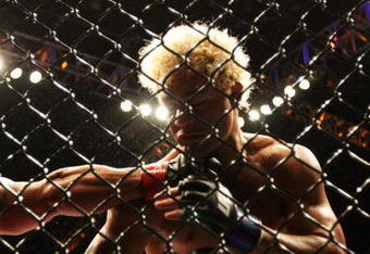 CHICAGO- OCTOBER 25:  Thiago Alves (L) punches Josh Koscheck in a Welterweight bout  at UFC's Ultimate Fight Night at Allstate Arena on October 25, 2008 in Chicago, Illinois. (Photo by Tasos Katopodis/Getty Images)