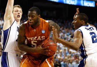 GREENSBORO, NC - MARCH 21:  Damion James #5 of the Texas Longhorns drives between Kyle Singler #12 and Nolan Smith #2 of the Duke Blue Devils during the second round of the NCAA Division I Men's Basketball Tournament at the Greensboro Coliseum on March 21, 2009 in Greensboro, North Carolina.  (Photo by Streeter Lecka/Getty Images)