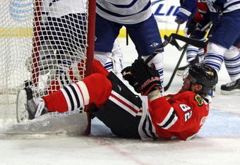CHICAGO - NOVEMBER 13: Tomas Kopecky #82 of the Chicago Blackhawks hits the goal post during a game against the Toronto Maple Leafs at the United Center on November 13, 2009 in Chicago, Illinois. The Blackhawks defeated the Maple Leafs 3-2. (Photo by Jonathan Daniel/Getty Images)