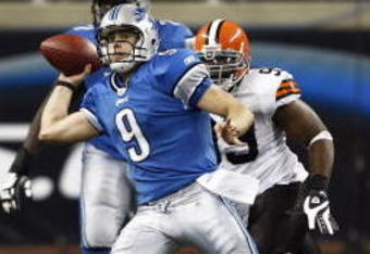 DETROIT, MI - NOVEMBER 22: Matthew Stafford #9 of the Detroit Lions passes the football while under pressure against the Cleveland Browns at Ford Field on November 22, 2009 in Detroit, Michigan. The Lions came from behind to defeat the Browns 38-37. (Photo by Joe Robbins/Getty Images)