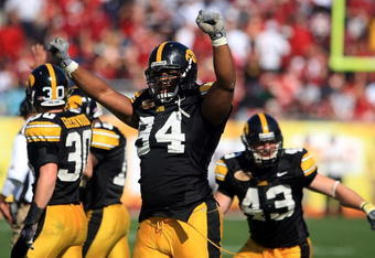 TAMPA, FL - JANUARY 01:  Adrian Clayborn #94 of the Iowa Hawkeyes celebrates after an interception against the South Carolina Gamecocks during the Outback Bowl on January 1, 2009 at Raymond James Stadium in Tampa, Florida.  (Photo by Scott Halleran/Getty Images)