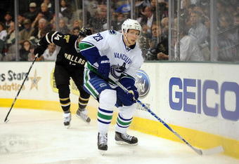 DALLAS - NOVEMBER 06:  Defenseman Alexander Edler #23 of the Vancouver Canucks at American Airlines Center on November 6, 2009 in Dallas, Texas.  (Photo by Ronald Martinez/Getty Images)