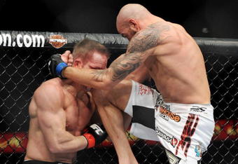 LAS VEGAS - NOVEMBER 21: Ben Saunders (R) battles Marcus Davis (L) during their Welterweight Fight at the UFC 106 at Mandalay Bay Events Center on November 21, 2009 in Las Vegas, Nevada. (Photo by Jon Kopaloff/Getty Images)