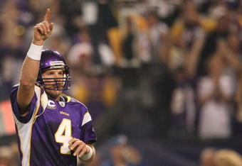 MINNEAPOLIS - NOVEMBER 22:  Brett Favre #4 of the Minnesota Vikings celebrates a touchdown against the Seattle Seahawks at Hubert H. Humphrey Metrodome on November 22, 2009 in Minneapolis, Minnesota.  (Photo by Nick Laham/Getty Images)