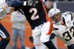 DENVER - NOVEMBER 22:  Quarterback Chris Simms #2 of the Denver Broncos is sacked by Kevin Burnett #99 and Eric Weddle #32 of the San Diego Chargers during NFL action at Invesco Field at Mile High on November 22, 2009 in Denver, Colorado.  (Photo by Doug Pensinger/Getty Images)