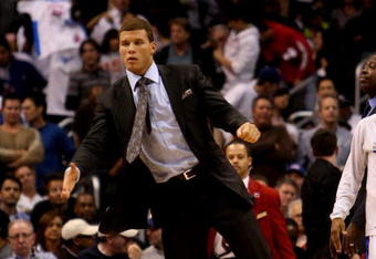 LOS ANGELES - OCTOBER 28:  Injured forward Blake Griffin #32 of the Los Angeles Clippers greets a teammate during a time out against the Phoenix Suns on October 28, 2009 at Staples Center in Los Angeles, California. The Suns won 109-107.   NOTE TO USER: User expressly acknowledges and agrees that, by downloading and/or using this Photograph, user is consenting to the terms and conditions of the Getty Images License Agreement. (Photo by Stephen Dunn/Getty Images)