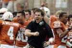 AUSTIN, TX - SEPTEMBER 5:  Defensive coordinator Will Muschamp of the Texas Longhorns gets pumped up after a turnover by the Louisiana Monroe Warhawks in the first quarter on September 5, 2009 at Darrell K Royal-Texas Memorial Stadium in Austin, Texas.  (Photo by Brian Bahr/Getty Images)