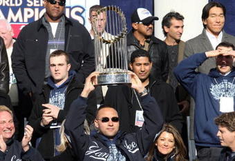 NEW YORK - NOVEMBER 06:  Captain Derek Jeter #2 of the New York Yankees celebrates with the championship trophy during the New York Yankees World Series Victory Celebration at City Hall on November 6, 2009 in New York, New York.  (Photo by Jim McIsaac/Getty Images)