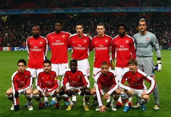 LONDON, ENGLAND - NOVEMBER 04:  Arsenal line up prior to the UEFA Champions League Group H match between Arsenal and AZ Alkmaar at the Emirates Stadium on November 4, 2009 in London, England.  (Photo by Phil Cole/Getty Images)