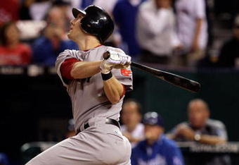 KANSAS CITY, MO - SEPTEMBER 21:  Jason Bay #44 of the Boston Red Sox watches his three run shot to left center off starting pitcher Lenny DiNardo #41 of the Kansas City Royals during the third inning of the game on September 21, 2009 at Kauffman Stadium in Kansas City, Missouri.  (Photo by Jamie Squire/Getty Images)