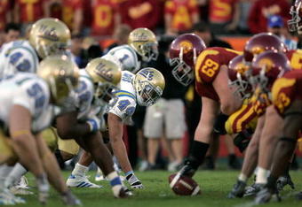 LOS ANGELES, CA - DECEMBER 01:  Bruce Davis #44 of the UCLA Bruins awaits the snap of the ball from the USC Trojans during the college football game at the Los Angeles Memorial Coliseum on December 1, 2007 in Los Angeles, California. The Trojans defeated the Bruins 24-7. (Photo by Jeff Gross/Getty Images)