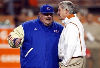 AUSTIN, TX - NOVEMBER 21:  Head coach Mark Mangino of the Kansas Jayhawks talks with Mack Brown of the Texas Longhorns at Darrell K Royal-Texas Memorial Stadium on November 21, 2009 in Austin, Texas.  (Photo by Ronald Martinez/Getty Images)