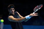LONDON, ENGLAND - NOVEMBER 24:  Juan Martin Del Potro of Argentina returns the ball during the men's singles second round match against Fernando Verdasco of Spain during the Barclays ATP World Tour Finals at the O2 Arena on November 24, 2009 in London, England.  (Photo by Clive Brunskill/Getty Images)