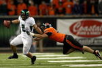 CORVALLIS, OR - NOVEMBER 29:  Quarterback Jeremiah Masoli #2  of the Oregon Ducks eludes the rush of Bryant Cornell #41 of the Oregon State Beavers at Reser Stadium on November 29, 2008 in Corvalis, Oregon.  (Photo by Jonathan Ferrey/Getty Images)