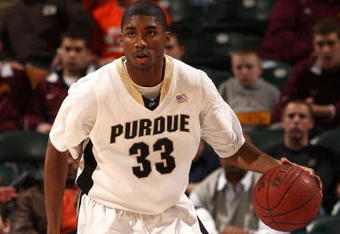 INDIANAPOLIS - MARCH 13:  E'Twaun Moore #33 of the Purdue Boilermakers brings the ball up court against the Penn State Nittany Lions during the second round of the Big Ten Men's Basketball Tournament at Conseco Fieldhouse on March 13, 2009 in Indianapolis, Indiana.  (Photo by Jonathan Daniel/Getty Images)