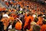 CLEMSON, SC - NOVEMBER 21:  C.J. Spiller #28 of the Clemson Tigers runs off the field after a 34-21 victory over the Virginia Cavaliers at Memorial Stadium on November 21, 2009 in Clemson, South Carolina.  (Photo by Streeter Lecka/Getty Images)