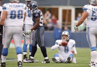 SEATTLE - NOVEMBER 08:  Quarterback Matthew Stafford #9 of the Detroit Lions on the ground after a play during the game against the Seattle Seahawks on November 8, 2009 at Qwest Field in Seattle, Washington. The Seahawks defeated the Lions 32-20. (Photo by Otto Greule Jr/Getty Images)
