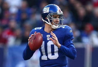 EAST RUTHERFORD, NJ - NOVEMBER 22:  Eli Manning #10 of the the New York Giants looks to pass against the Atlanta Falcons on November 22, 2009 at Giants Stadium in East Rutherford, New Jersey.  (Photo by Chris McGrath/Getty Images)