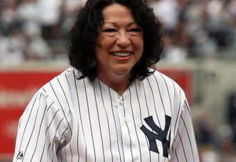 NEW YORK - SEPTEMBER 26:  United States Supreme Court Justice Sonia Sotomayor smiles after throwing out the ceremonial first pitch before the New York Yankees play the Boston Red Sox on September 26, 2009 at Yankee Stadium in the Bronx borough of New York City.  (Photo by Jim McIsaac/Getty Images)