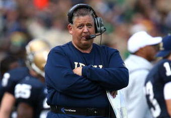 SOUTH BEND, IN - OCTOBER 03: Head coach Charlie Weis of the Notre Dame Fighting Irish watches as his team takes on the Washington Huskies on October 3, 2009 at Notre Dame Stadium in South Bend, Indiana.  Notre Dame defeated Washington 37-30 in overtime.  (Photo by Jonathan Daniel/Getty Images)
