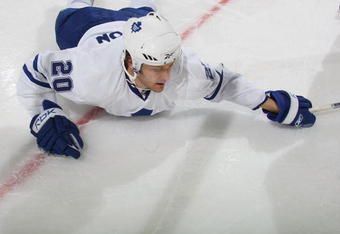 NEWARK, NJ - APRIL 07: Christian Hanson #20 of the Toronto Maple Leafs hits the ice against the New Jersey Devils on April 7, 2009 at the Prudential Center in Newark, New Jersey.The Maple Leafs defeated the Devils 4-1. (Photo by Bruce Bennett/Getty Images)