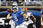 DETROIT, MI - NOVEMBER 22: Matthew Stafford #9 of the Detroit Lions passes the football while under pressure against the Cleveland Browns at Ford Field on November 22, 2009 in Detroit, Michigan. The Lions came from behind to defeat the Browns 38-37. (Photo by Joe Robbins/Getty Images)