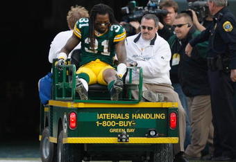 GREEN BAY, WI - NOVEMBER 22: Defensive back Al Harris #31 of the Green Bay Packers is taken off the field on a cart after an injury against the San Francisco 49ers at Lambeau Field on November 22, 2009 in Green Bay, Wisconsin. The Packers defeated the 49ers 30-24. (Photo by Scott Boehm/Getty Images)