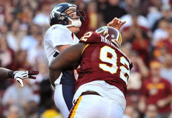 LANDOVER, MD - NOVEMBER 15:  Albert Haynesworth #92 of the Washington Redskins sacks Chris Simms #2 of the Denver Broncos at FedExField on November 15, 2009 in Landover, Maryland. The Redskins defeated the Broncos 27-17. (Photo by Larry French/Getty Images)