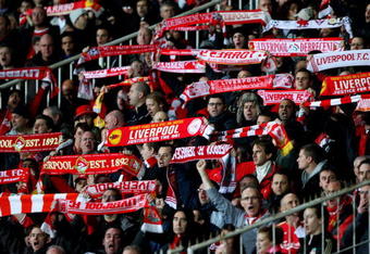 BUDAPEST, HUNGARY - NOVEMBER 24:  Liverpool fans support their team during the UEFA Champions League group E match between Debrecen and Liverpool at the Ferenc Puskas Stadium on November 24, 2009 in Budapest, Hungary.  (Photo by Richard Heathcote/Getty Images)