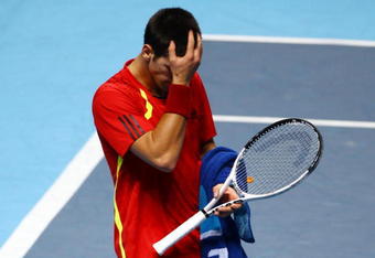 LONDON, ENGLAND - NOVEMBER 25:  Novak Djokovic of Serbia reacts during the men's singles first round match against Robin Soderling of Sweden during the Barclays ATP World Tour Finals at the O2 Arena on November 25, 2009 in London, England.  (Photo by Matthew Lewis/Getty Images for Barclays ATP Finals)