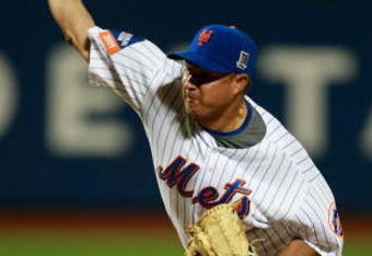 NEW YORK - AUGUST 22:  Elmer Dessens #64 of the New York Mets pitches against the Philadelphia Phillies during the game on August 22, 2009 at Citi Field in the Flushing neighborhood of the Queens borough of New York City.  (Photo by Jared Wickerham/Getty Images)