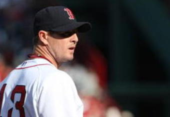 BOSTON - OCTOBER 11:  Pitcher Billy Wagner #13 of the Boston Red Sox replaces Daniel Bard #60 in the eight inning of Game Three of the ALDS against the Los Angeles Angels of Anaheim during the 2009 MLB Playoffs at Fenway Park on October 11, 2009 in Boston, Massachusetts. (Photo by Elsa/Getty Images)