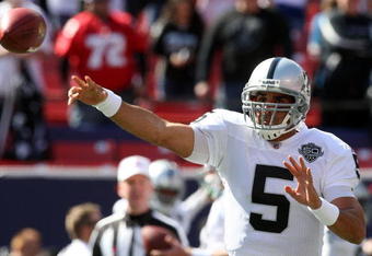 EAST RUTHERFORD, NJ - OCTOBER 11:  Bruce Gradkowski #5 of the Oakland Raiders warms up before playing the New York Giants on October 11, 2009 at Giants Stadium in East Rutherford, New Jersey.  (Photo by Jim McIsaac/Getty Images)