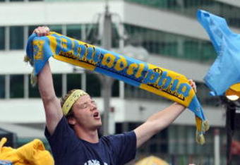 PHILADELPHIA - MAY 11:  Soccer fans cheer as the Philadelphia Union soccer team of the MLS release their name, colors and logo at a press conference on May 11, 2009 at City Hall in Philadelphia, Pennsylvania. (Photo by Drew Hallowell/Getty Images for Philadelphia Union)