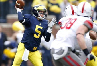 ANN ARBOR, MI - NOVEMBER 21: Tate Forcier #5 of the Michigan Wolverines throws a first quarter pass while playing the Ohio State Buckeyes on November 21, 2009 at Michigan Stadium in Ann Arbor, Michigan.  (Photo by Gregory Shamus/Getty Images)