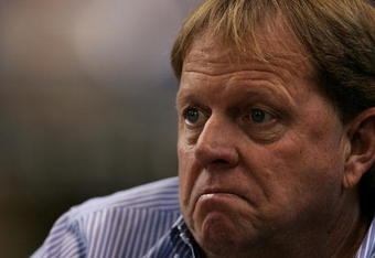 MILWAUKEE - JUNE 4: General Manager Jim Hendry of the Chicago Cubs talks with reporters before a game against the Milwaukee Brewers at Miller Park June 4, 2007 in Milwaukee, Wisconsin. (Photo by Jonathan Daniel/Getty Images)