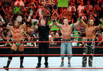LAS VEGAS - AUGUST 24:  (L-R) Wrestler Triple H, World Wrestling Entertainment Inc. Chairman Vince McMahon, and wrestlers John Cena and Shawn Michaels pose in the ring during the WWE Monday Night Raw show at the Thomas & Mack Center August 24, 2009 in Las Vegas, Nevada.  (Photo by Ethan Miller/Getty Images)