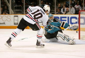 SAN JOSE, CA - NOVEMBER 25:  Patrick Sharp #10 of the Chicago Blackhawks scores a shorthanded goal against Evgeni Nabokov #20 of the San Jose Sharks during their game at HP Pavilion on November 25, 2009 in San Jose, California.  (Photo by Ezra Shaw/Getty Images)