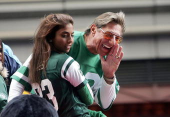 NEW YORK - NOVEMBER 25:  Football star Joe Namath yells to the crowd as he passes on a float in Times Square during the 78th Annual Macy's Thanksgiving Day Parade November 25, 2004 in New York City. Thousands attended the parade which featured 15 giant character balloons and 27 floats. (Photo by Mario Tama/Getty Images)