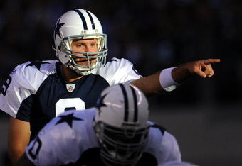 ARLINGTON, TX - NOVEMBER 26:  Quarterback Tony Romo #9 of the Dallas Cowboys during play against the Oakland Raiders at Cowboys Stadium on November 26, 2009 in Arlington, Texas.  (Photo by Ronald Martinez/Getty Images)