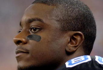 Detroit Lions wide receiver Charles Rogers watches play during  a Thanksgiving Day game, November 24, 2005, at Ford Field, Detroit.  The Atlanta Falcons defeated the Lions 27 - 7.  (Photo by Al Messerschmidt/Getty Images)