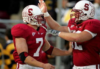 PALO ALTO, CA - NOVEMBER 21:  Toby Gerhart #7 is congratulated by Chase Beeler #72 of the Stanford Cardinal after Gerhart scored a touchdown against the California Bears at Stanford Stadium on November 21, 2009 in Palo Alto, California.  (Photo by Ezra Shaw/Getty Images)