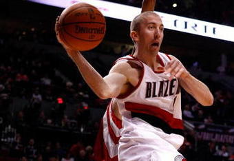 PORTLAND, OR - OCTOBER 27:  Steve Blake #2 of the Portland Trail Blazers drives against the Houston Rockets during the season opener on October 27, 2009 at the Rose Garden in Portland, Oregon. NOTE TO USER: User expressly acknowledges and agrees that, by downloading and or using this Photograph, user is consenting to the terms and conditions of the Getty Images License Agreement.  (Photo by Jonathan Ferrey/Getty Images)