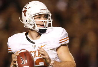 COLLEGE STATION, TX - NOVEMBER 26: Quarterback Colt McCoy #12 of the Texas Longhorns looks to pass the ball downfield against the Texas A&M Aggies in the second half at Kyle Field on November 26, 2009 in College Station, Texas. The Longhorns defeated the Aggies 49-39. (Photo by Aaron M. Sprecher/Getty Images)